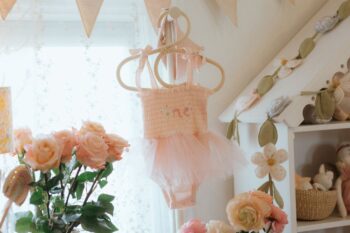 Wild Wawa First Birthday Tutu ~ Pink 5 Wild Wawa Pink One Tutu displayed with roses