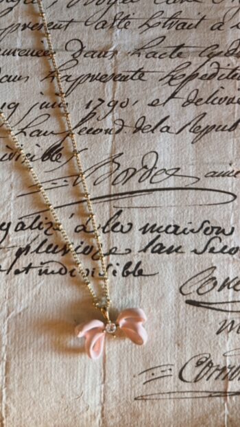 Les Nereides Ribbon & Gold Necklace on ancient paper