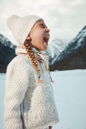 Louise Misha Alicia Jumper side on girl at snow