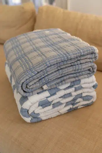 New Grain French Plaid Twin Blanket Bluebell on bed