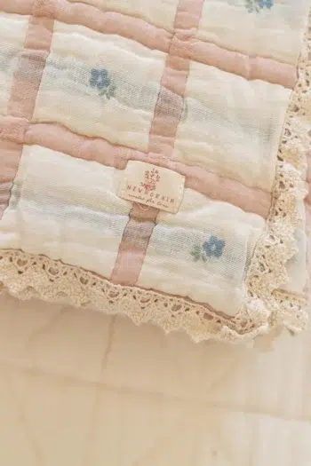 New Grain Quilt Meadow with pretty blue flowers