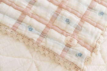 New Grain Quilt Meadow with pretty blue flowers