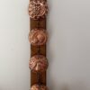 Vintage Copper Fruit Moulds on Wooden Wall Rack