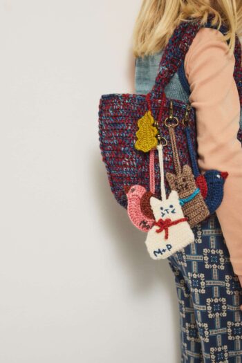 Misha & Puff Bag Charms on backpack