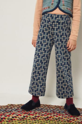 Misha and Puff A-Pant in Moonlight Railroad Floral print organic pima cotton on girl close up of print